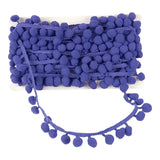 3/4" Pompom Trim by 10 yard rolls. Available in 21 colors.